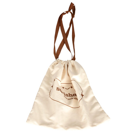 large tan dust bag closed