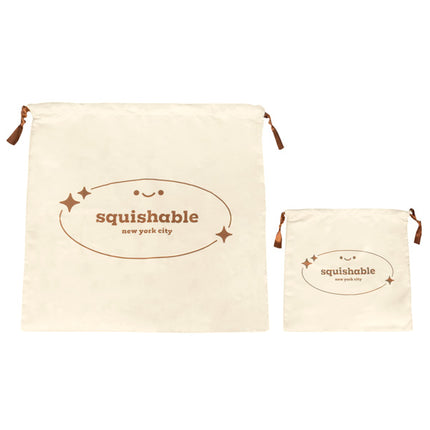 large tan dust bag size comparison