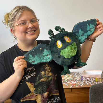 mini dark forest baby mothman user photo